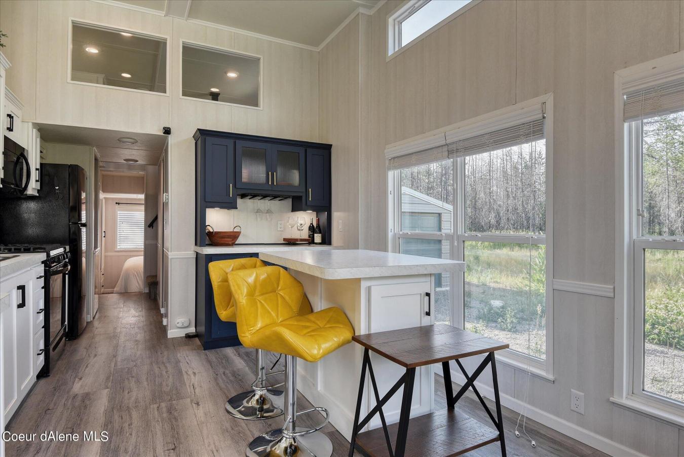 You simply must see this adorable tiny home with a shop tucked away on – image 6