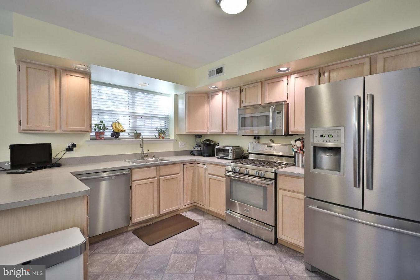 Welcome home to easy living in Elkins Park! This magnificent custom co – image 17