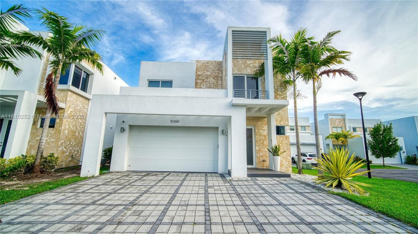 Discover luxury living in one of Dorals top gated communities. This fu – image 2