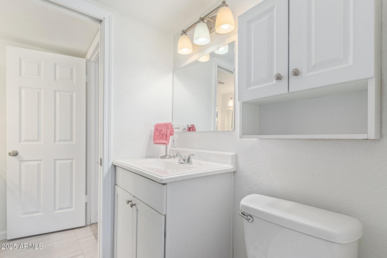 Freshly updated with brand NEW carpet and paint, this lower level, Nor – image 12