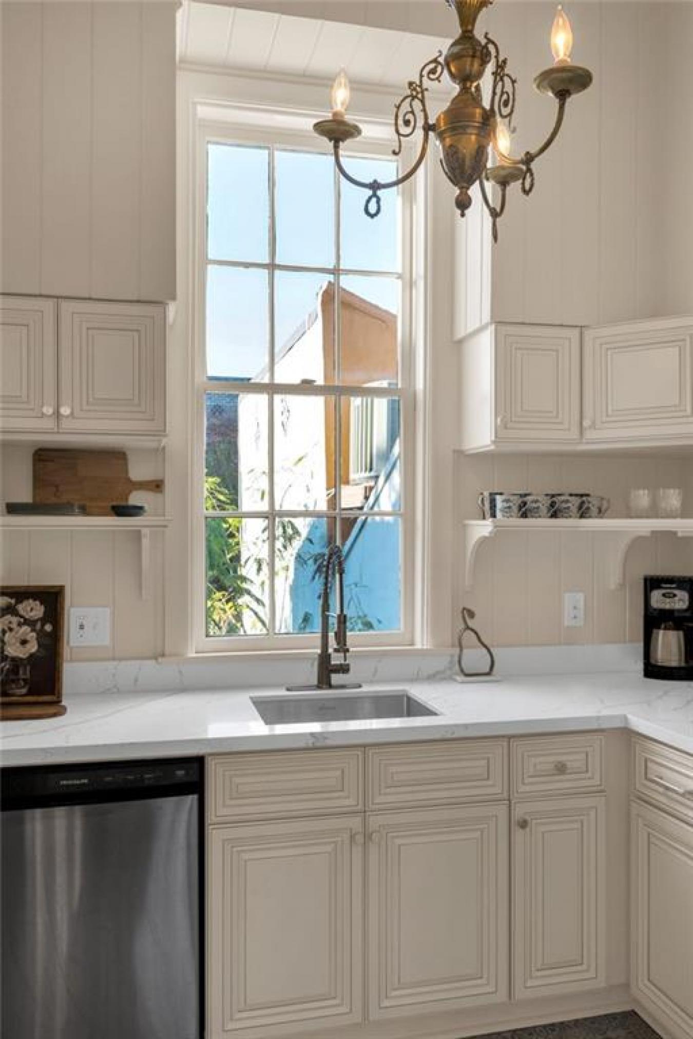 Perfectly situated in a beautifully restored Creole townhouse, this on – image 11