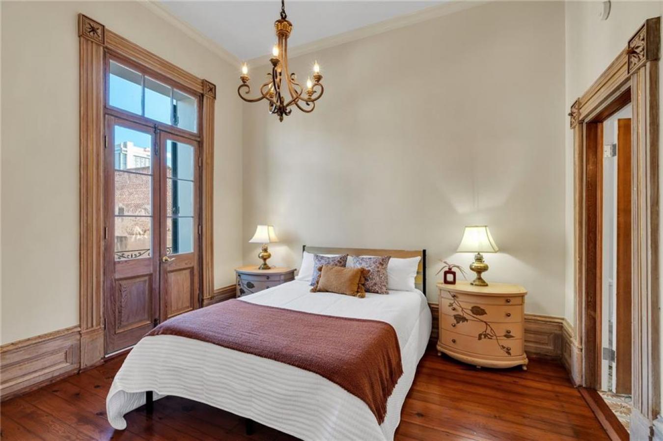 Perfectly situated in a beautifully restored Creole townhouse, this on – image 15