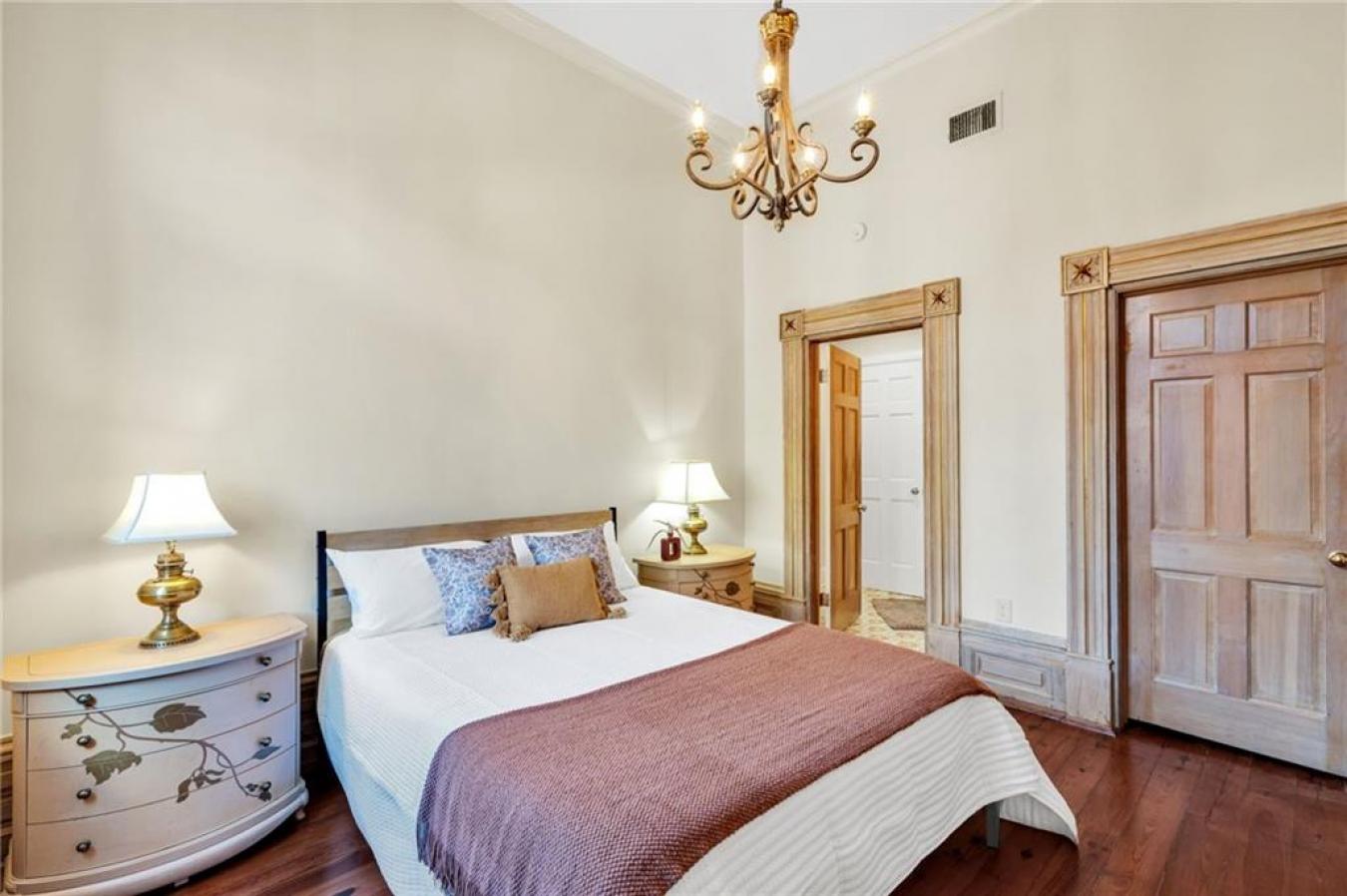 Perfectly situated in a beautifully restored Creole townhouse, this on – image 16