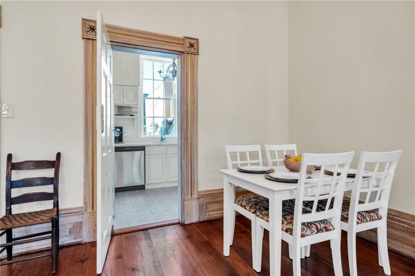 Perfectly situated in a beautifully restored Creole townhouse, this on – image 8