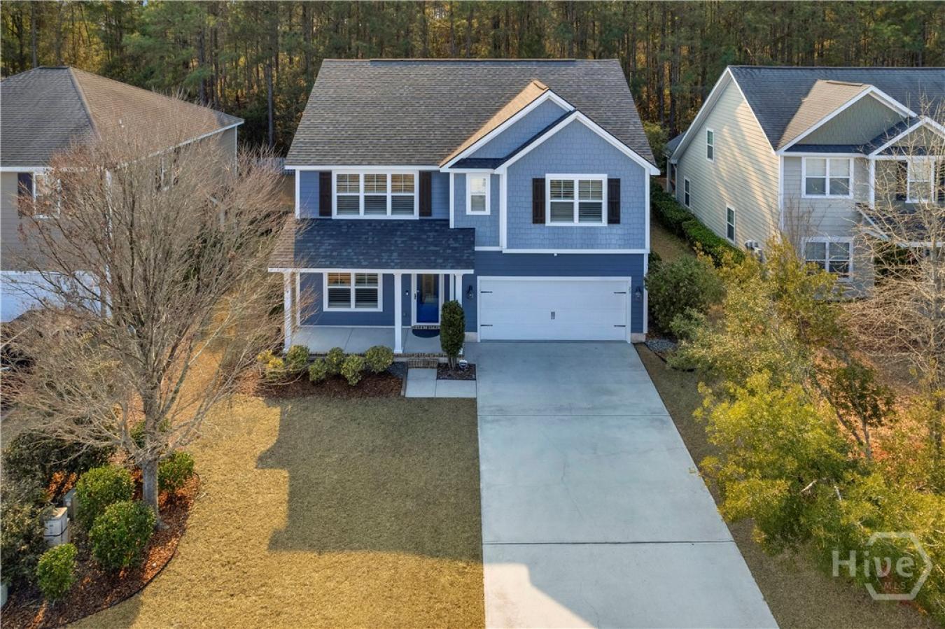 Tucked inside the gated community of The Enclave, this home backs to p – image 1