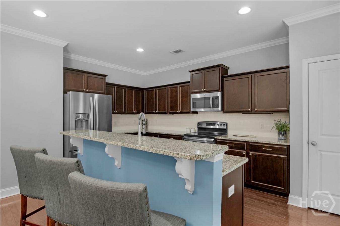 Tucked inside the gated community of The Enclave, this home backs to p – image 10