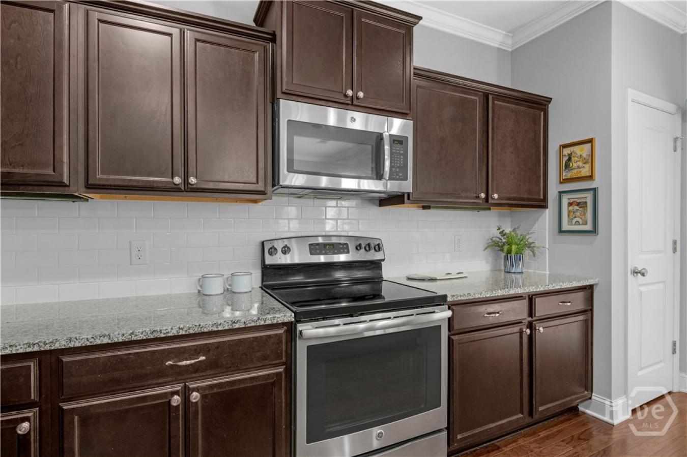 Tucked inside the gated community of The Enclave, this home backs to p – image 11