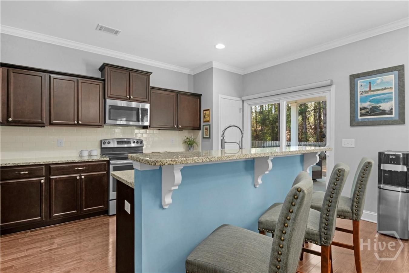 Tucked inside the gated community of The Enclave, this home backs to p – image 9
