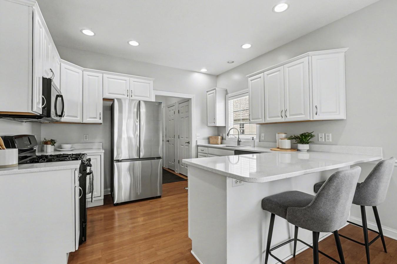 Welcome to this beautifully updated condo that perfectly blends style, – image 7