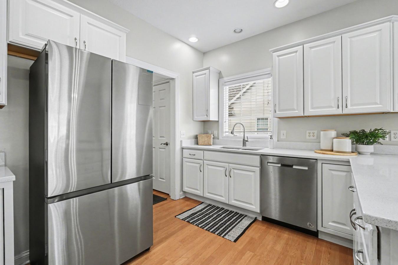 Welcome to this beautifully updated condo that perfectly blends style, – image 8