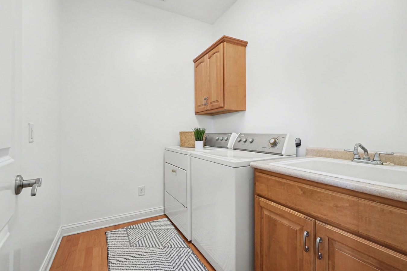Welcome to this beautifully updated condo that perfectly blends style, – image 9