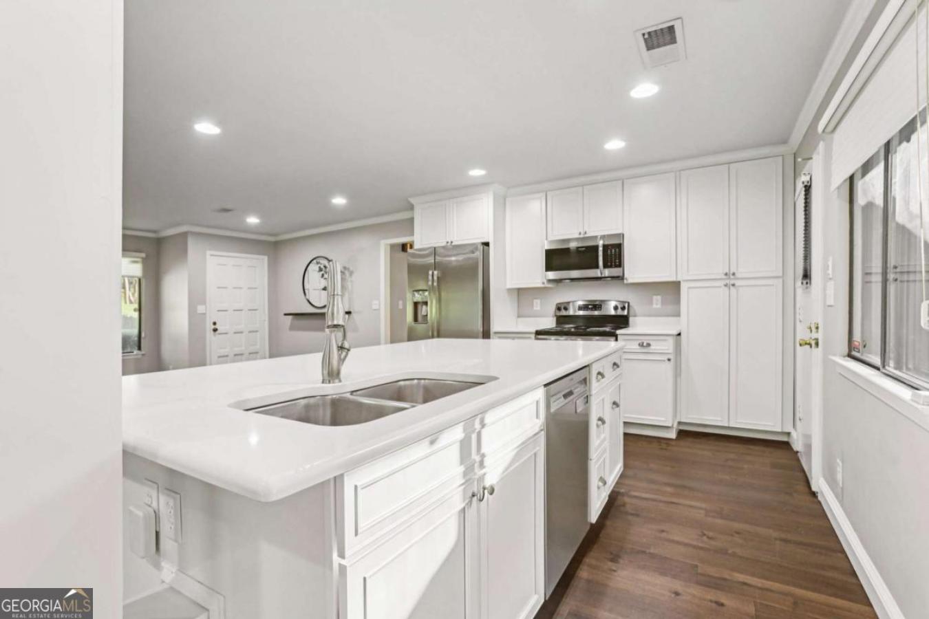 Rare 2-bedroom, 2-bath condo in East Cobb that lives more like a townh – image 12