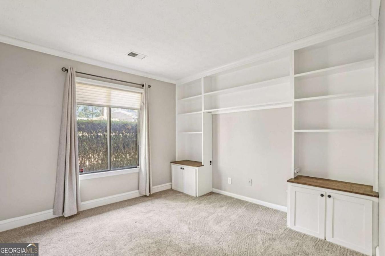 Rare 2-bedroom, 2-bath condo in East Cobb that lives more like a townh – image 17