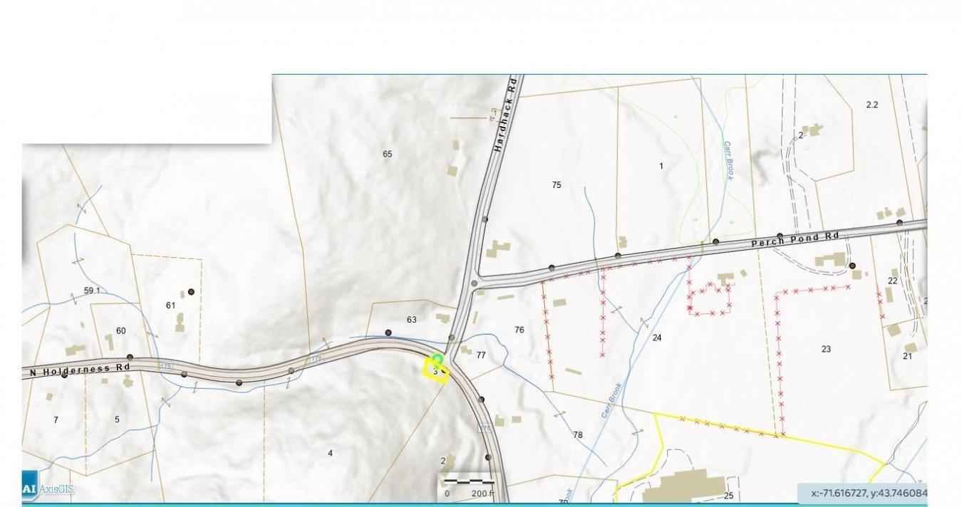 This 0.111-acre lot has a cabin and shed that will have to be removed – image 11