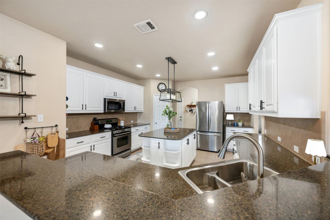 Situated on a spacious .204-acre corner lot, this beautifully maintain – image 17