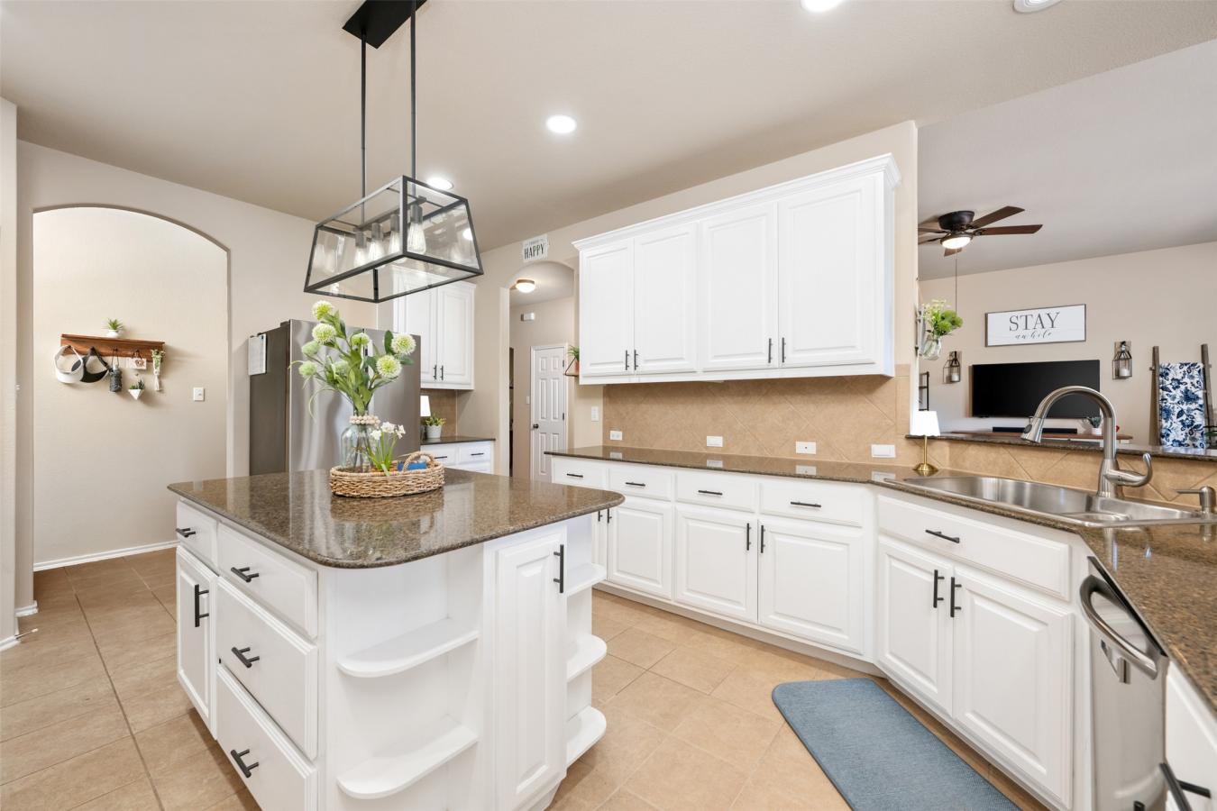 Situated on a spacious .204-acre corner lot, this beautifully maintain – image 18