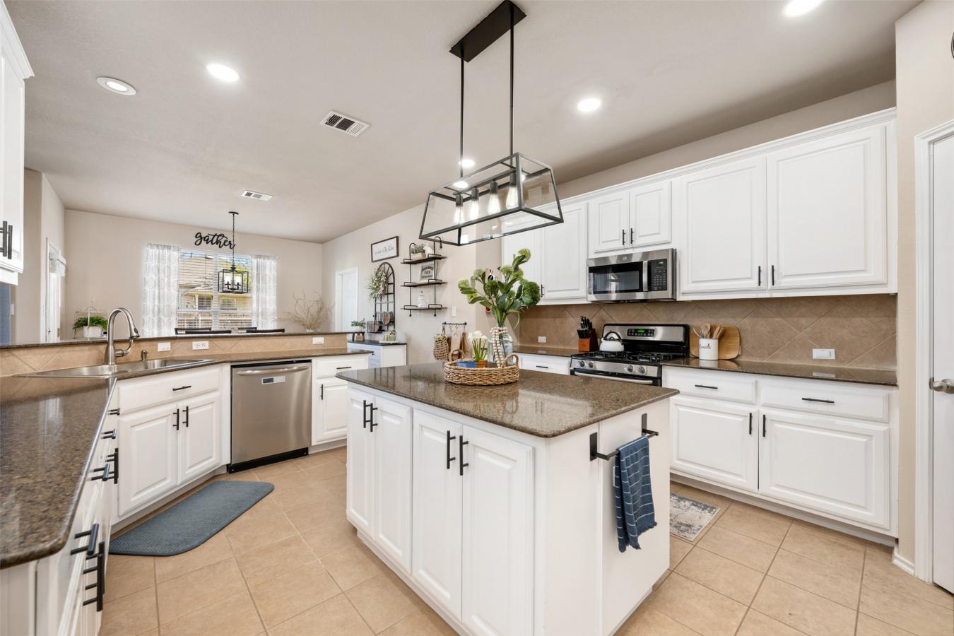 Situated on a spacious .204-acre corner lot, this beautifully maintain – image 19
