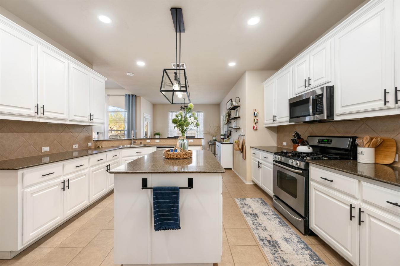Situated on a spacious .204-acre corner lot, this beautifully maintain – image 3