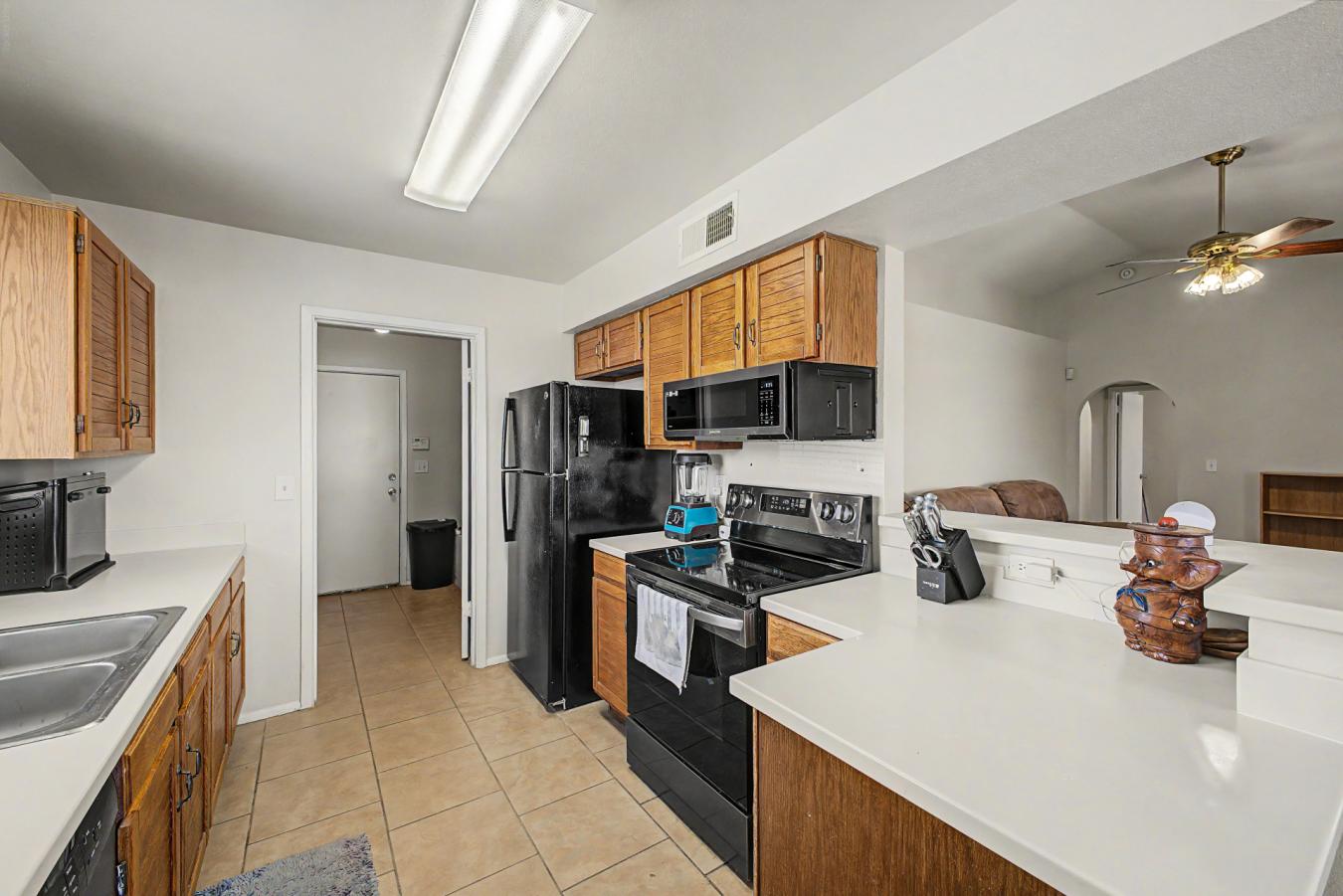 NEWER AC - WATER HEATER - ROOF: Vaulted ceilings and a corner unit giv – image 12