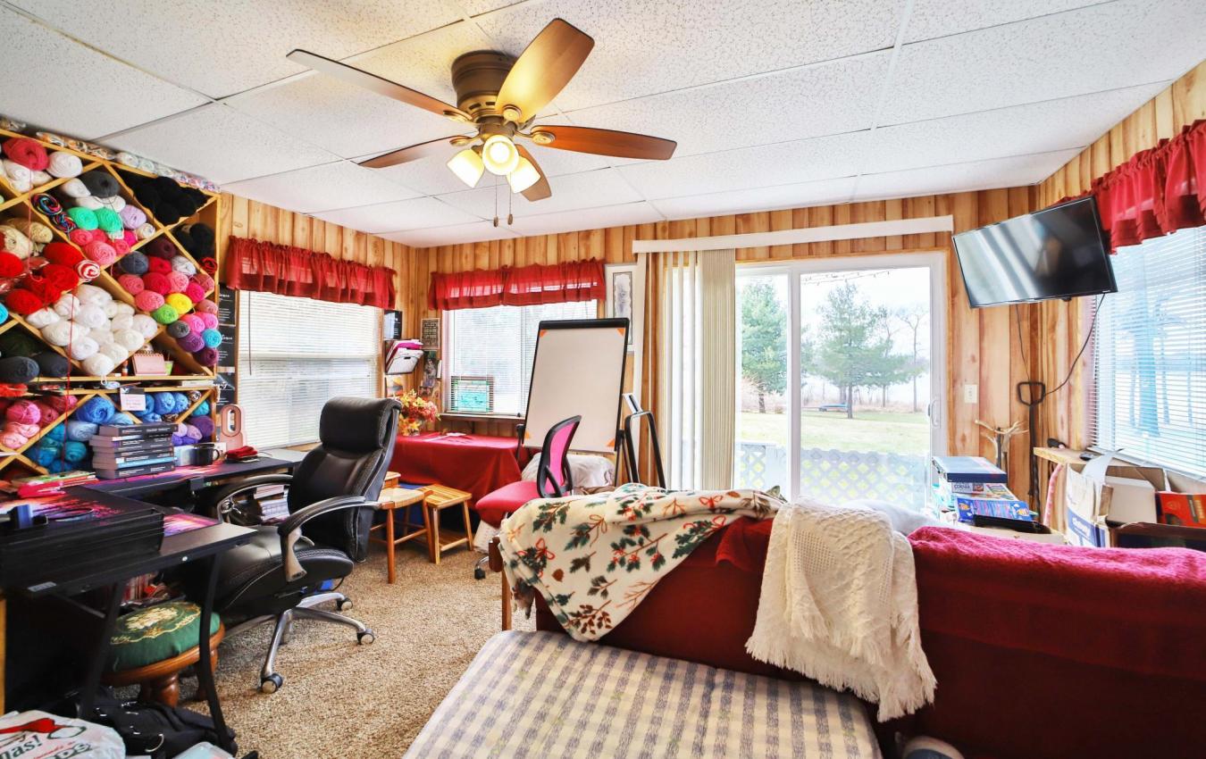 Set on a sprawling 3-acre lot along the shores of Perch Lake in Merrif – image 10