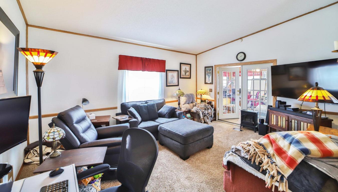 Set on a sprawling 3-acre lot along the shores of Perch Lake in Merrif – image 13