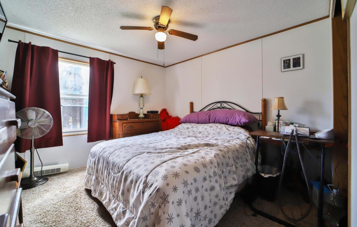 Set on a sprawling 3-acre lot along the shores of Perch Lake in Merrif – image 19