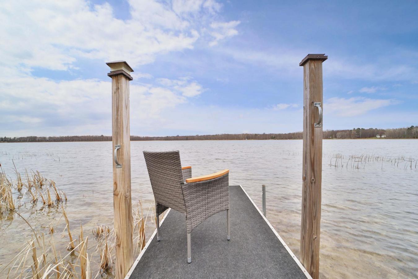 Set on a sprawling 3-acre lot along the shores of Perch Lake in Merrif – image 2