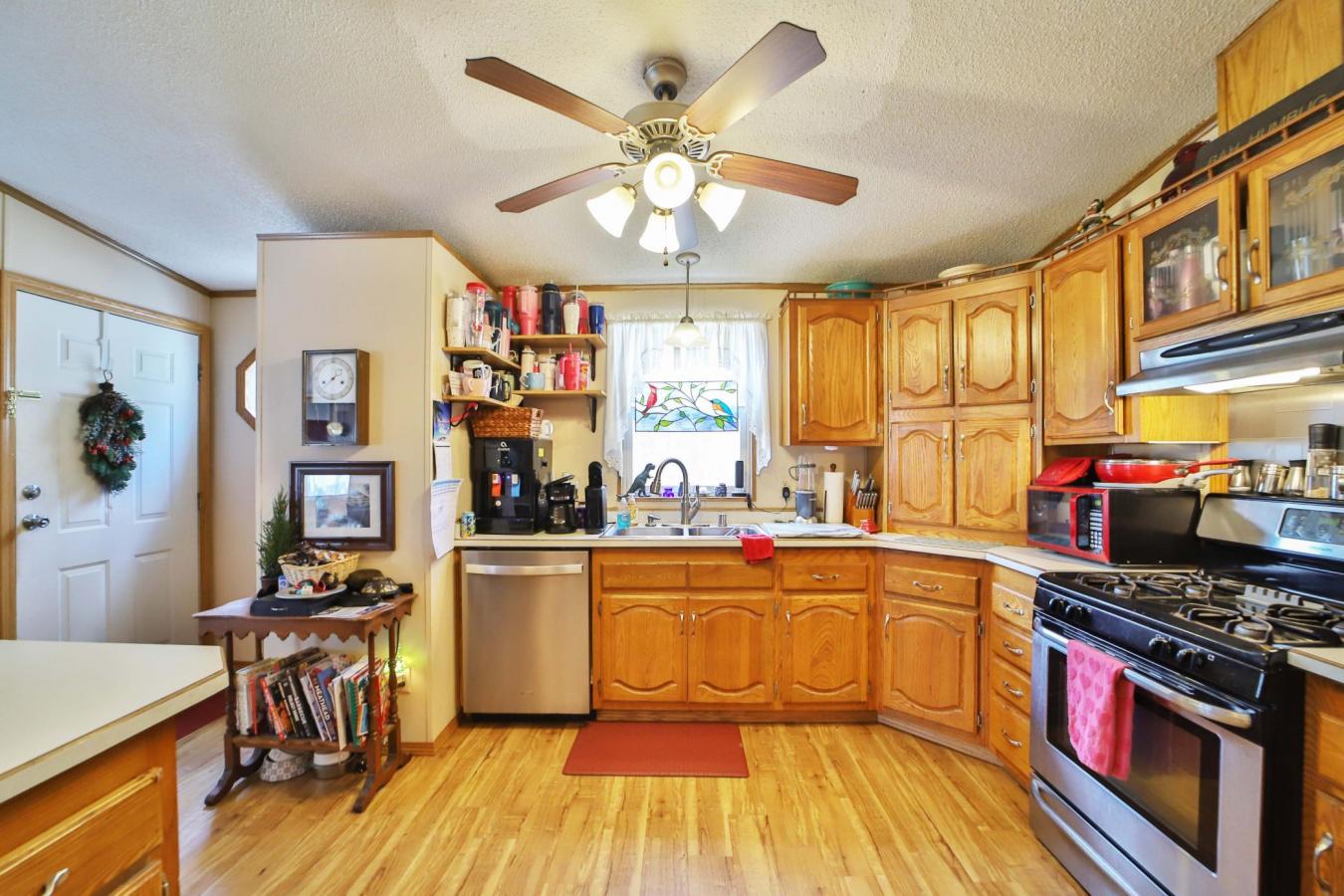 Set on a sprawling 3-acre lot along the shores of Perch Lake in Merrif – image 5