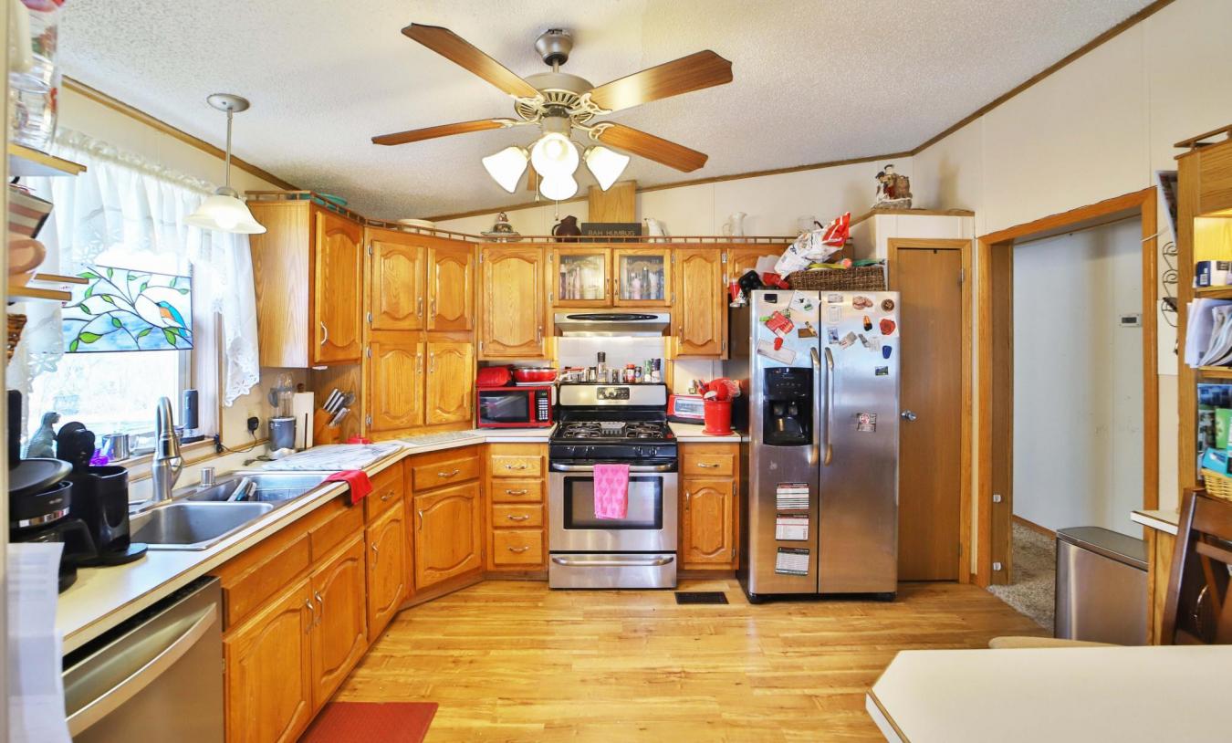 Set on a sprawling 3-acre lot along the shores of Perch Lake in Merrif – image 7
