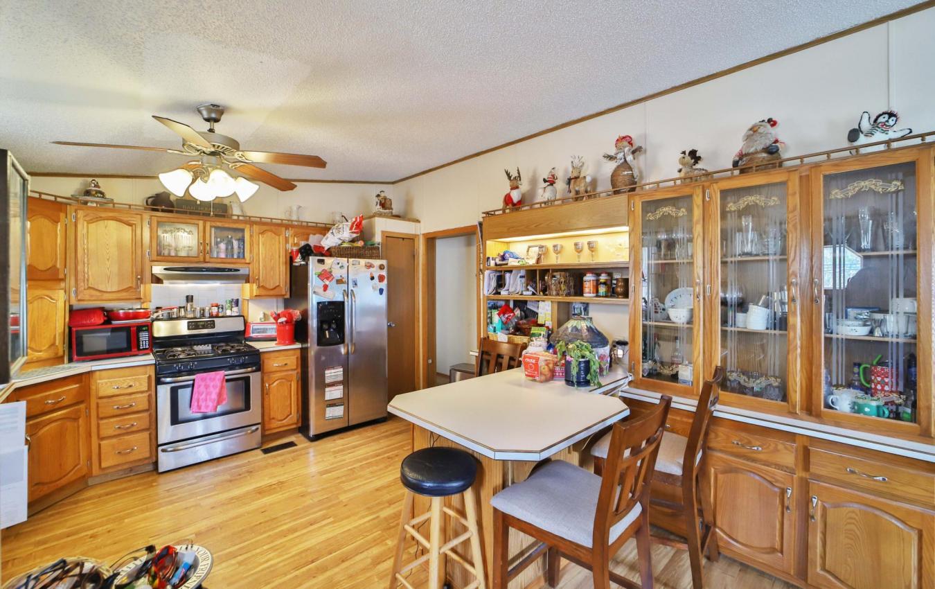 Set on a sprawling 3-acre lot along the shores of Perch Lake in Merrif – image 8