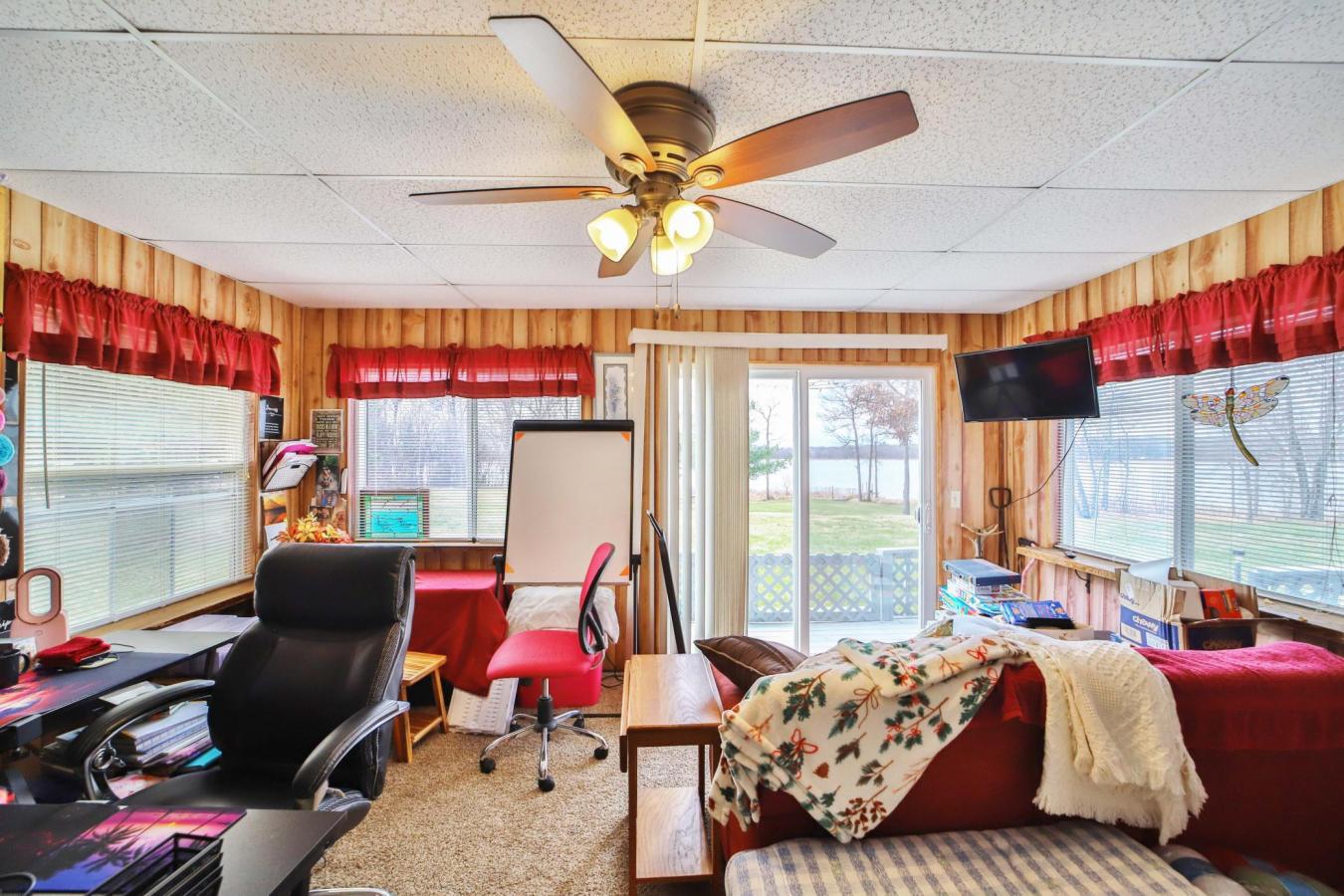 Set on a sprawling 3-acre lot along the shores of Perch Lake in Merrif – image 9