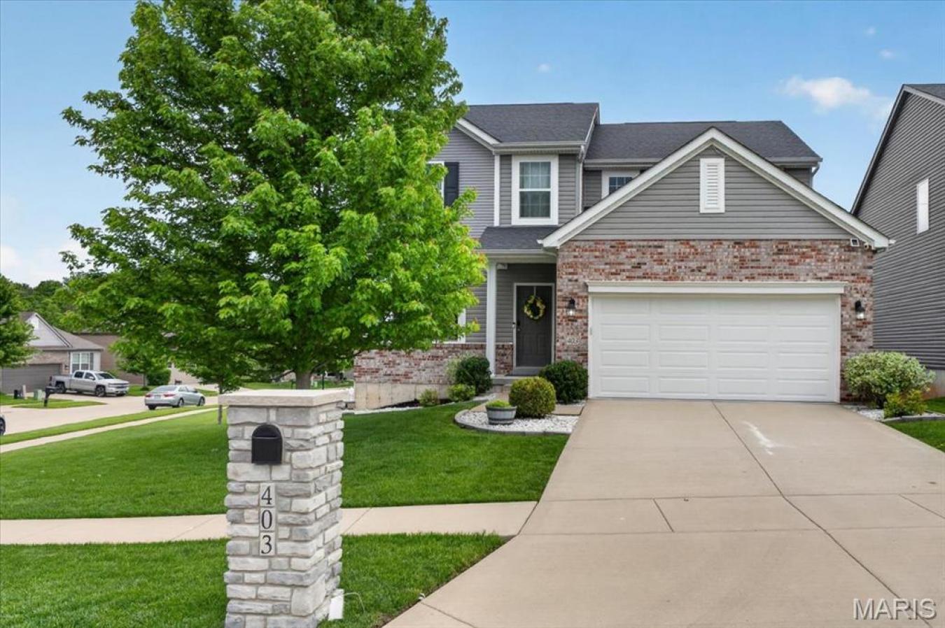 Welcome to 403 Wilmer Meadow Drive in the desirable Manors at Wilmer V – image 1