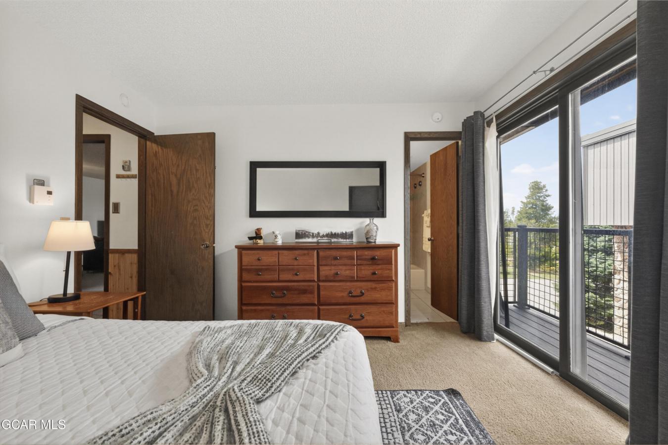 This inviting mountain retreat makes for a perfect full-time home, wee – image 17