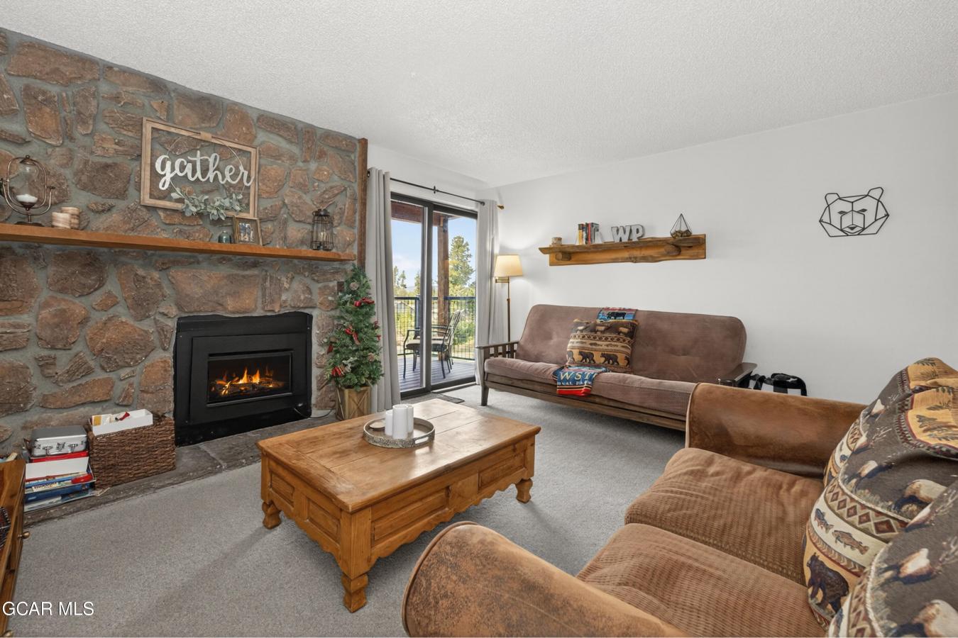 This inviting mountain retreat makes for a perfect full-time home, wee – image 8