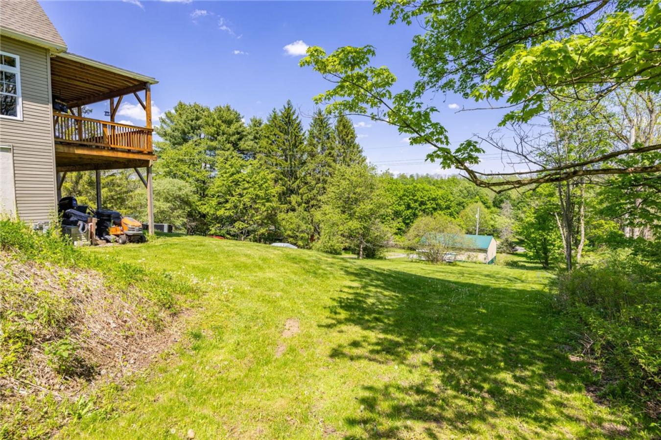 Perched high above the treetops on nearly 5 breathtaking acres, this e – image 11
