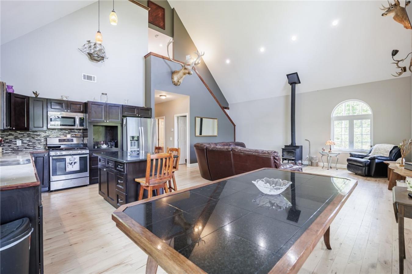 Perched high above the treetops on nearly 5 breathtaking acres, this e – image 13