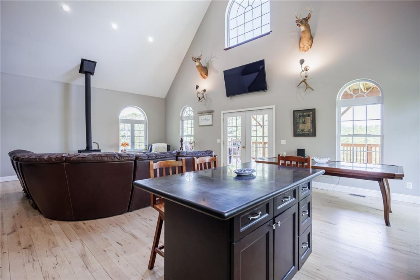 Perched high above the treetops on nearly 5 breathtaking acres, this e – image 14