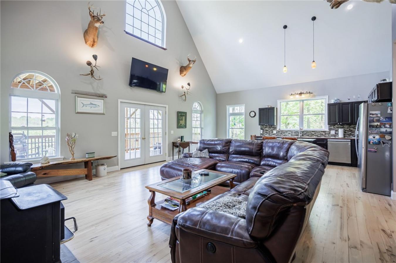 Perched high above the treetops on nearly 5 breathtaking acres, this e – image 15