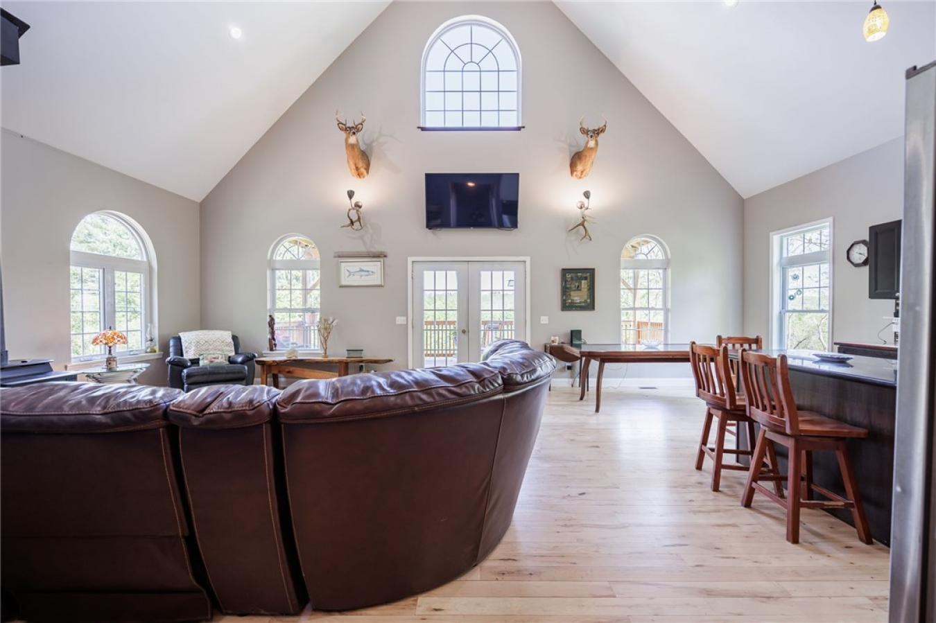 Perched high above the treetops on nearly 5 breathtaking acres, this e – image 16