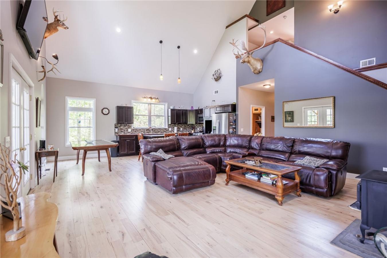 Perched high above the treetops on nearly 5 breathtaking acres, this e – image 17