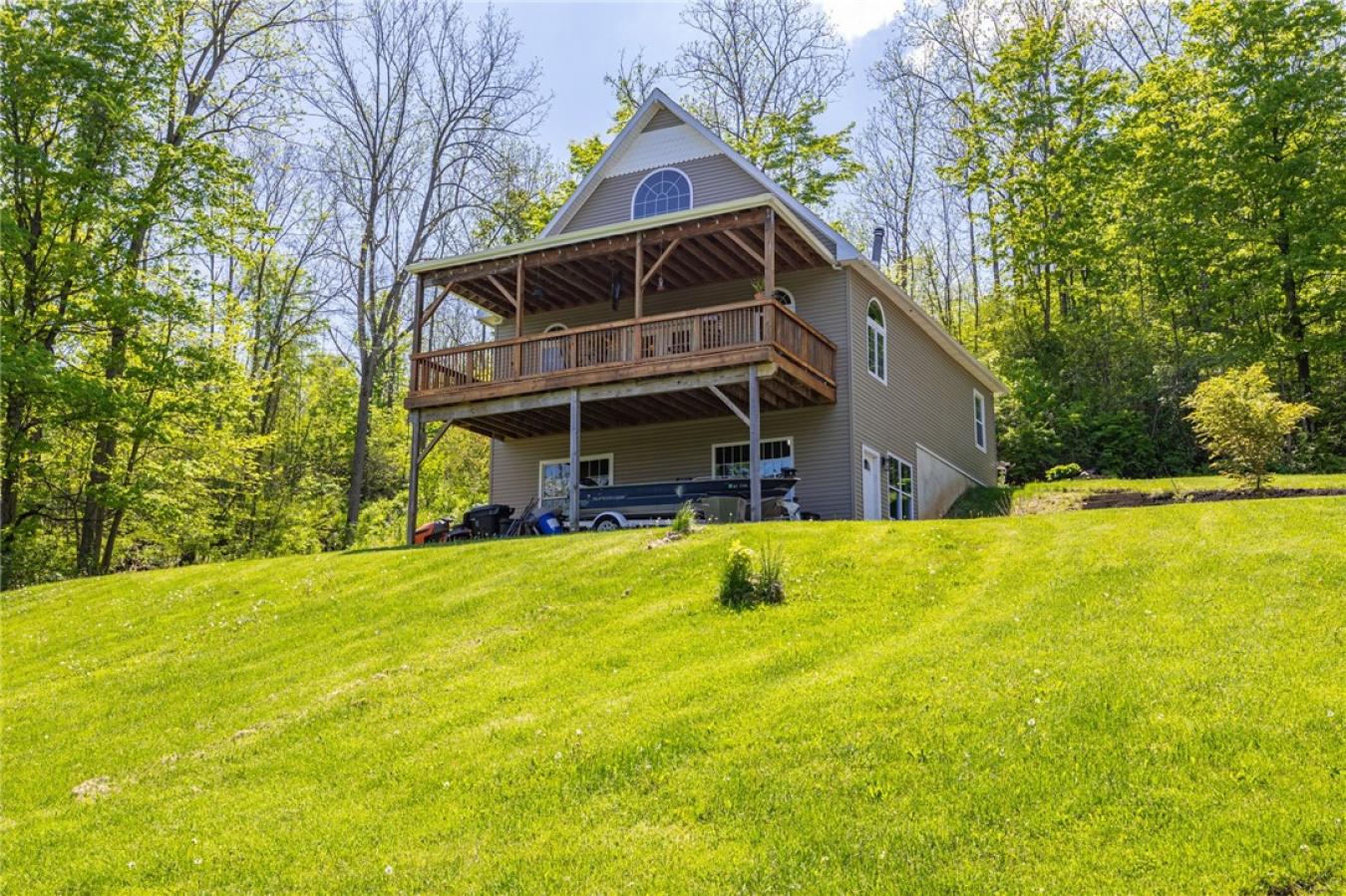 Perched high above the treetops on nearly 5 breathtaking acres, this e – image 5