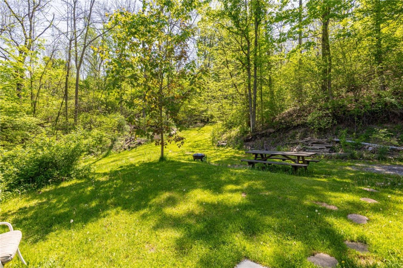 Perched high above the treetops on nearly 5 breathtaking acres, this e – image 7