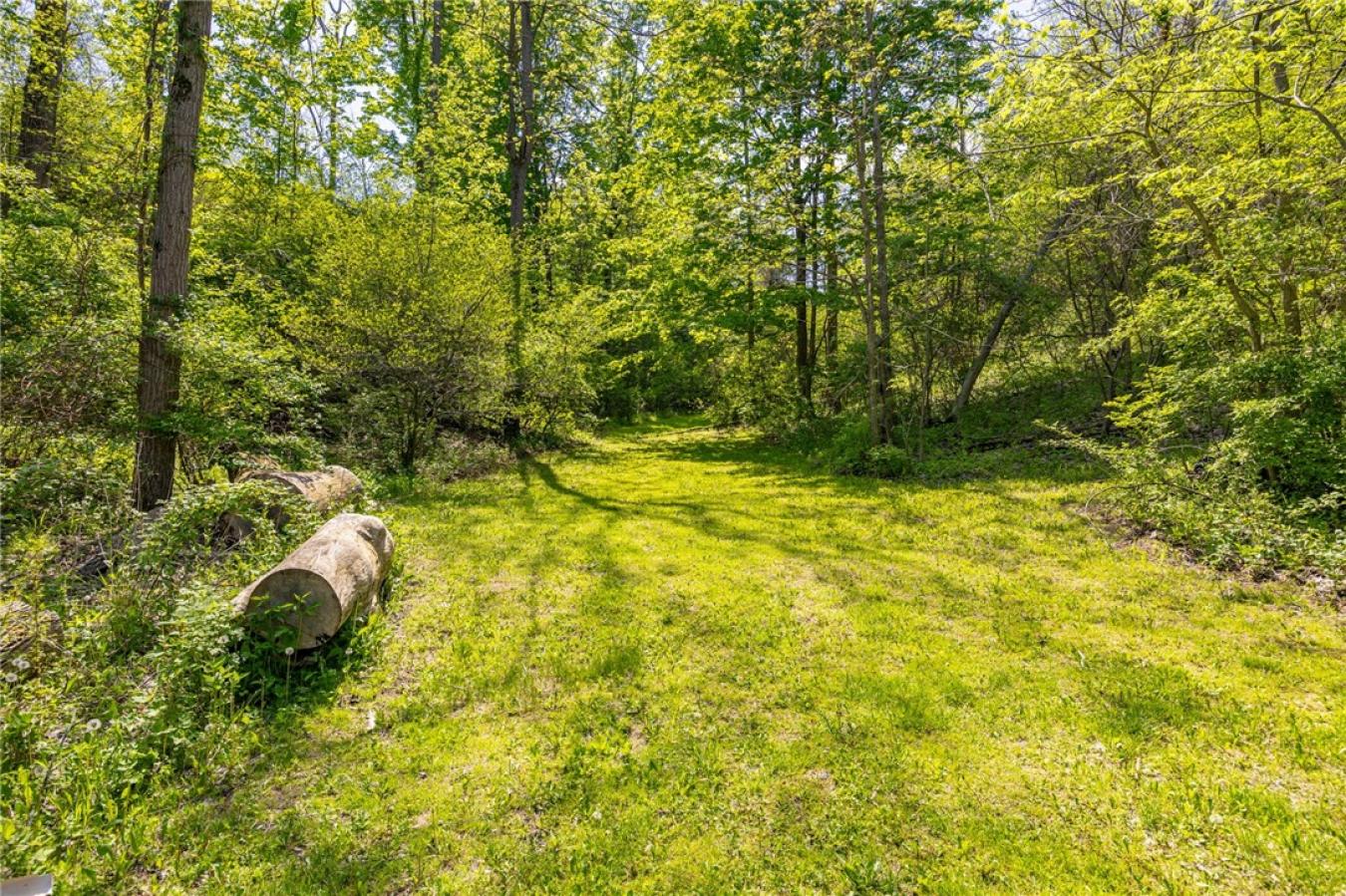 Perched high above the treetops on nearly 5 breathtaking acres, this e – image 8