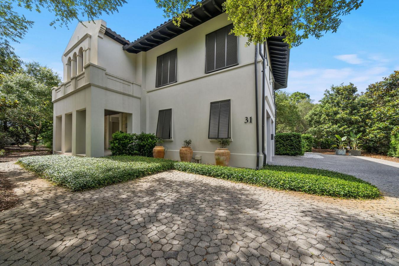 Tucked beneath a canopy of majestic Southern live oaks, this exception – image 3