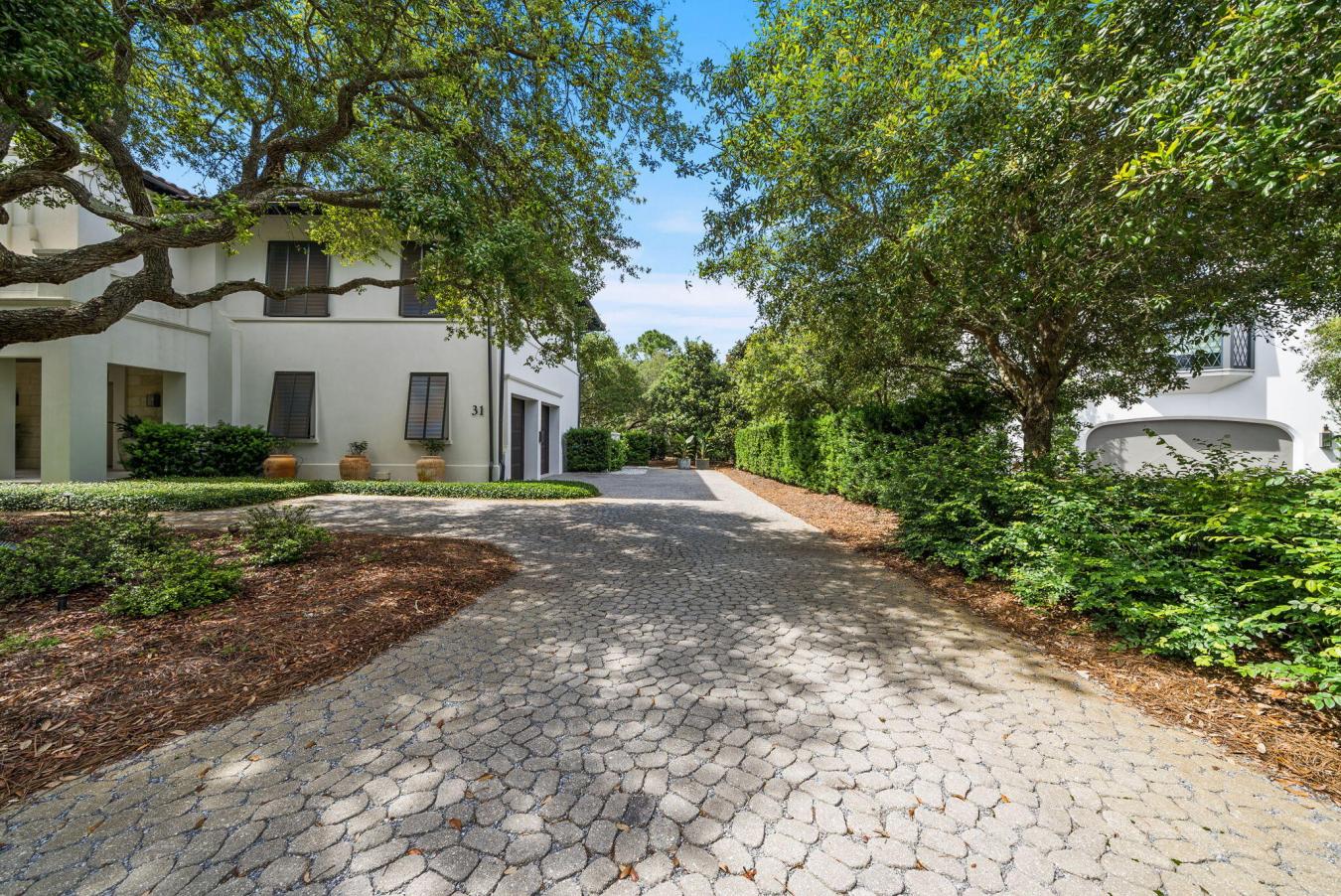Tucked beneath a canopy of majestic Southern live oaks, this exception – image 4