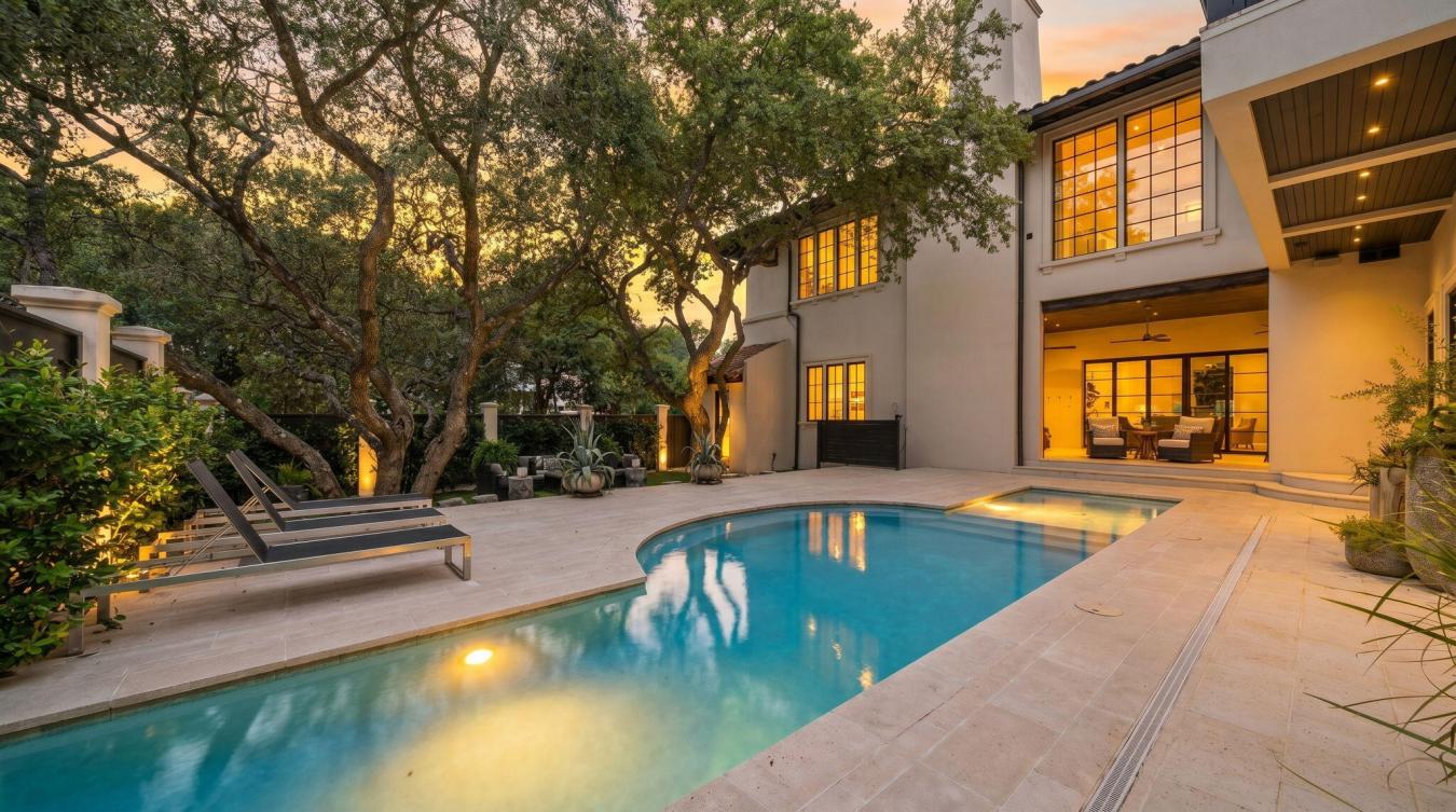Tucked beneath a canopy of majestic Southern live oaks, this exception – image 6