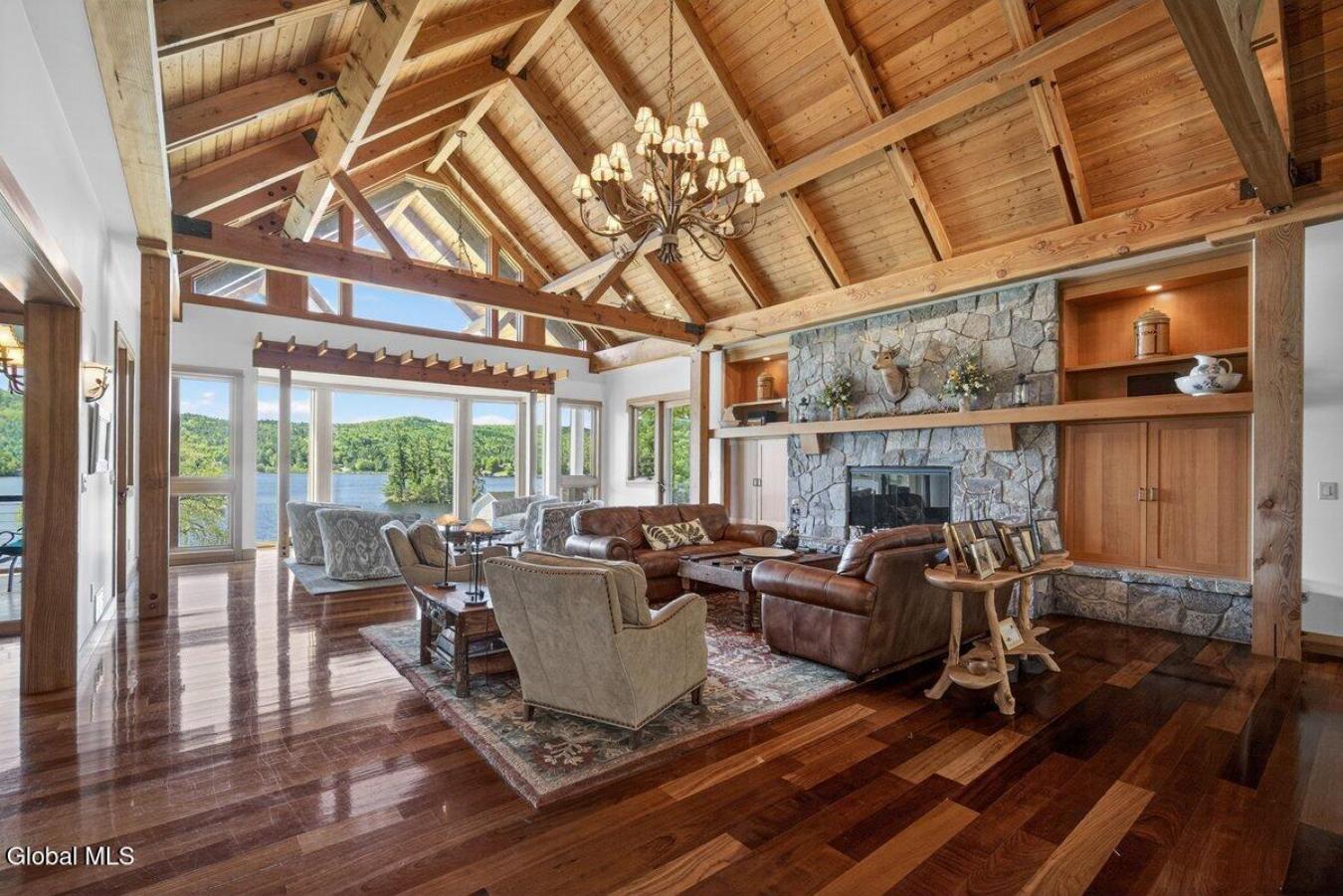 A historic Adirondack legacy, the Island House Estate offers a rare, c – image 1