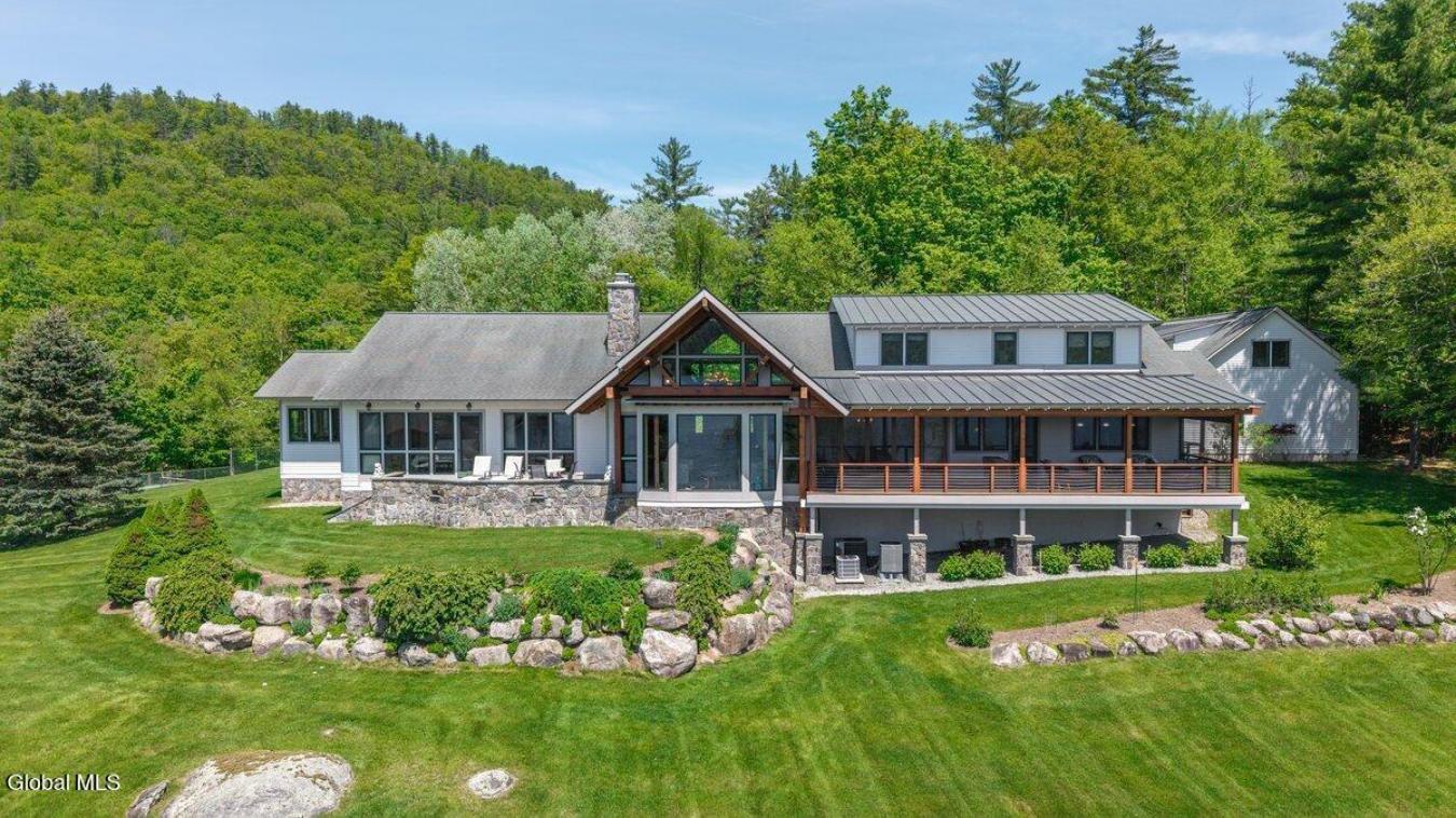 A historic Adirondack legacy, the Island House Estate offers a rare, c – image 4