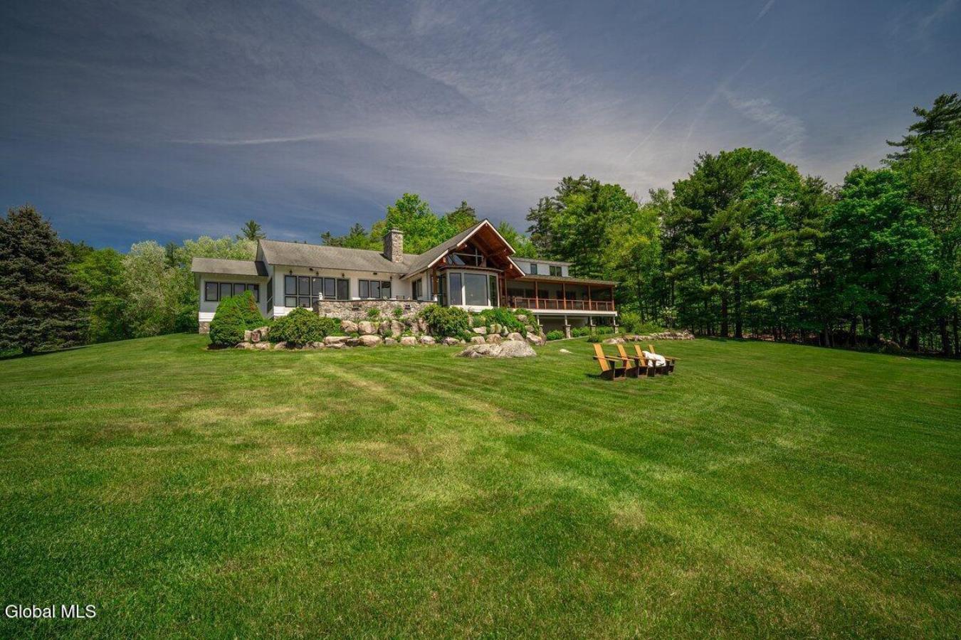 A historic Adirondack legacy, the Island House Estate offers a rare, c – image 5