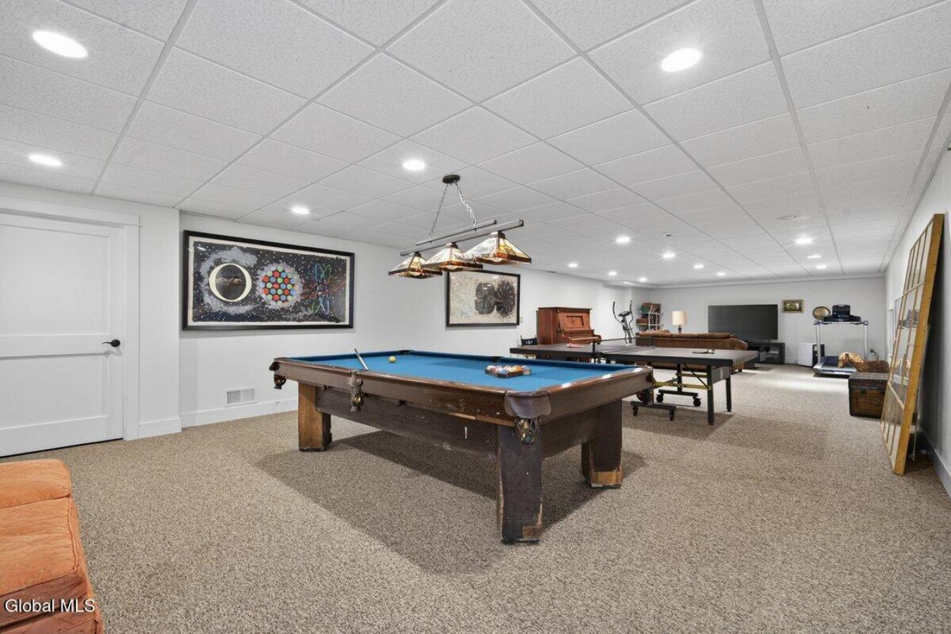 A historic Adirondack legacy, the Island House Estate offers a rare, c – image 9